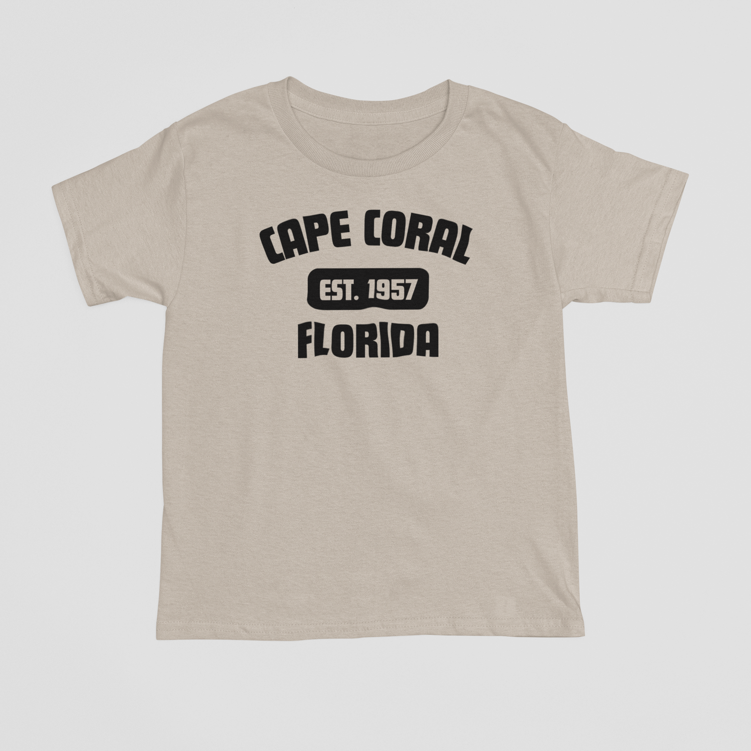 Beige t-shirt with 'Cape Coral, Florida' text on a white background