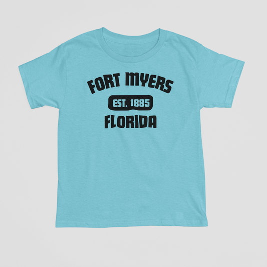 Light blue t-shirt with black text 'FORT MYERS FLORIDA' on a light gray background