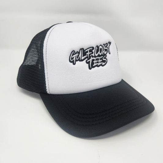 White and black cap with text on a light gray background